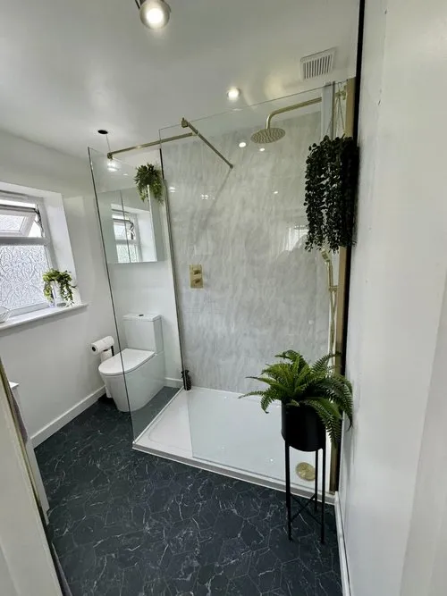 Modern bathroom installation with walk-in shower