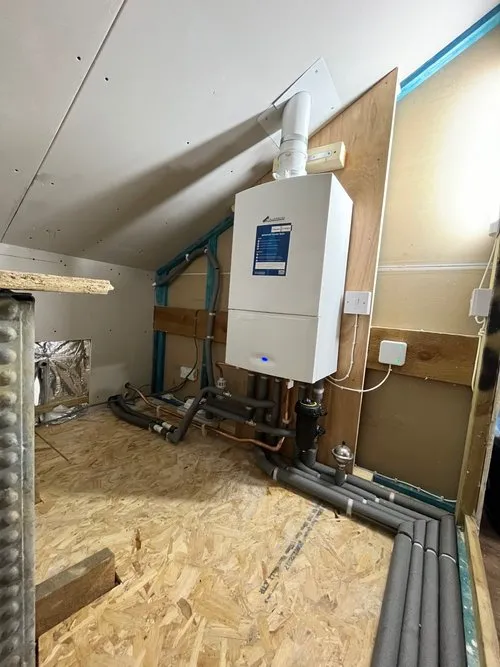 Compact boiler installation in utility space